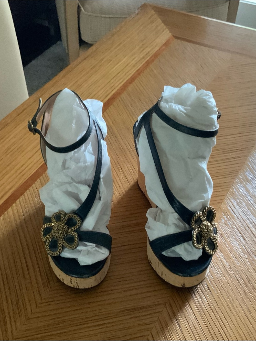 Chloe Black Wedge Sandals with Gold Floral Medallion